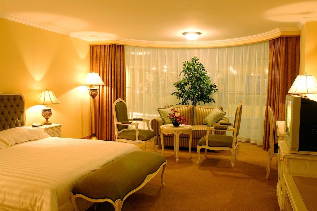 New Gloria Plaza Garden Hotel Haerpin Szoba fotó
